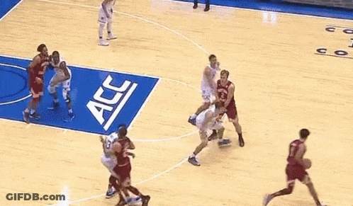 A Basketball Game Is Being Played On A Court Sponsored By Acc And Coach K GIF