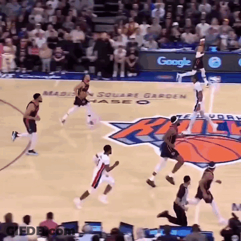 A Basketball Game Is Being Played On A Court Sponsored By Google GIF