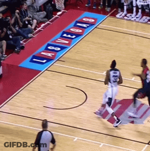 A Basketball Game Is Being Played On A Court Sponsored By Las Vegas GIF