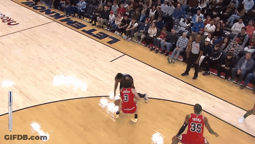 A Basketball Game Is Being Played On A Court Sponsored By Let Em Know GIF