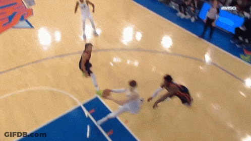 A Basketball Game Is Being Played On A Court Sponsored By Msc GIF
