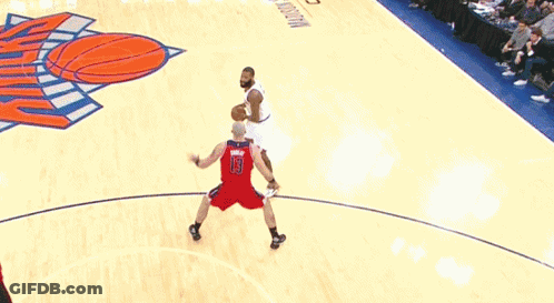 A Basketball Game Is Being Played On A Court That Has A Hoop On It GIF