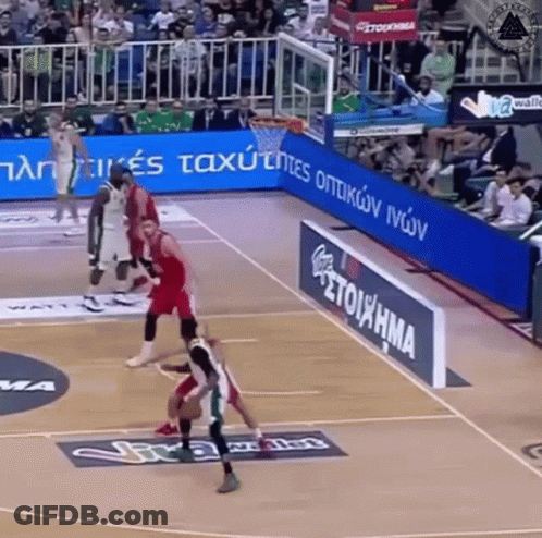 A Basketball Game Is Being Played On A Court That Has A Sign That Says Stoiathma GIF