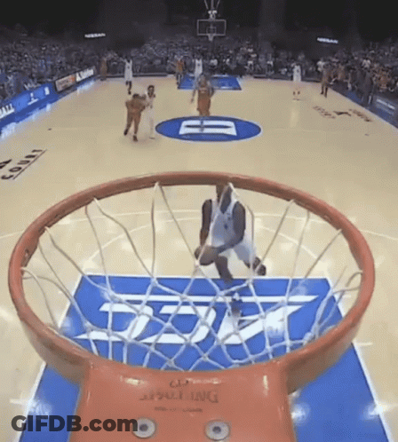 A Basketball Game Is Being Played On A Court That Has A Spalding Logo On It GIF