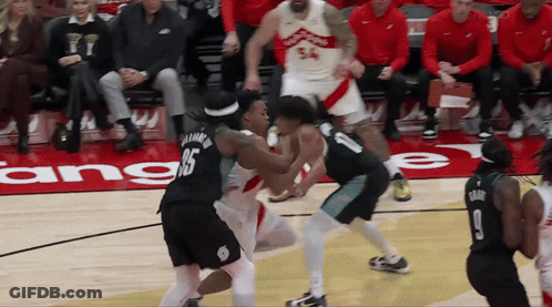 A Basketball Game Is Being Played On A Court That Has The Word Anger On The Floor GIF