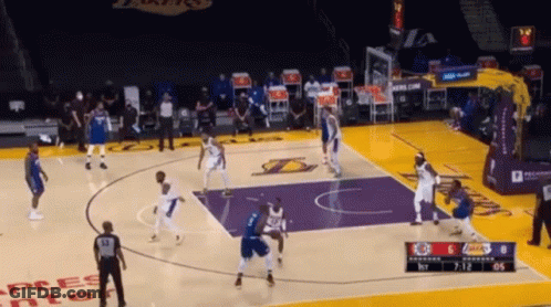 A Basketball Game Is Being Played On A Court That Has The Word Lakers On It GIF