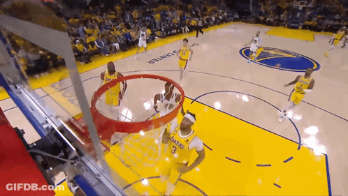 A Basketball Game Is Being Played On A Court That Has The Word Lakers On It GIF