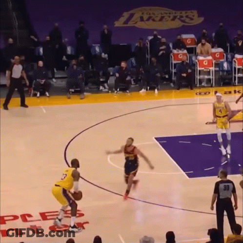 A Basketball Game Is Being Played On A Court That Has The Word Lakers On It GIF