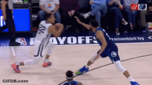A Basketball Game Is Being Played On A Court That Has The Word Payoffs On It GIF
