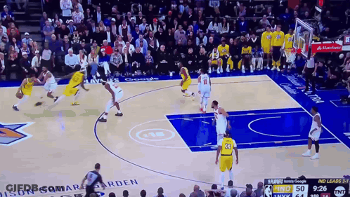 A Basketball Game Is Being Played On A Court That Has The Word Square On It GIF