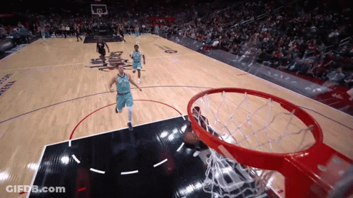 A Basketball Game Is Being Played On A Court That Says Arena GIF