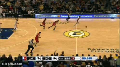 A Basketball Game Is Being Played On A Court That Says Bankers Field GIF