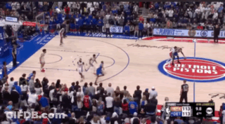 A Basketball Game Is Being Played On A Court That Says Detroit Pistons GIF