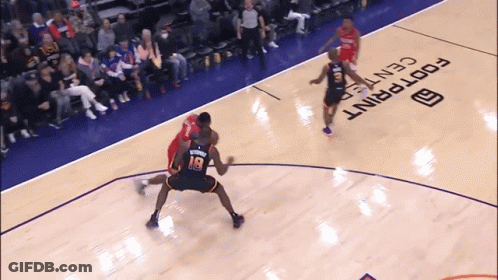 A Basketball Game Is Being Played On A Court That Says Footprint Center GIF