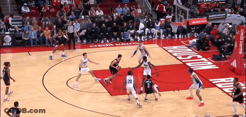 A Basketball Game Is Being Played On A Court That Says Houston On It GIF