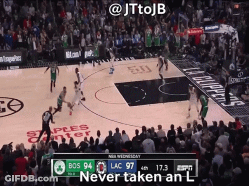 A Basketball Game Is Being Played On A Court That Says Staples Center GIF