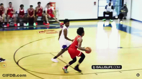 A Basketball Game Is Being Played On A Court With A Ballislife.com Logo GIF