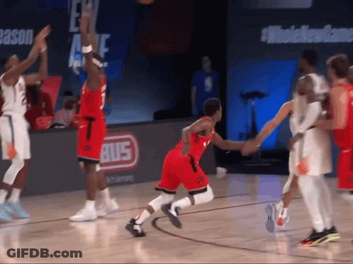 A Basketball Game Is Being Played On A Court With A Bus Sign In The Background GIF