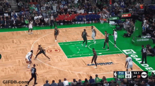 A Basketball Game Is Being Played On A Court With A Coinbase Ad GIF