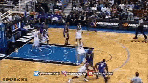 A Basketball Game Is Being Played On A Court With A Hankook Advertisement In The Background GIF