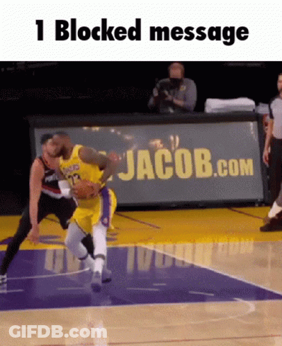 A Basketball Game Is Being Played On A Court With A Jacob.com Banner In The Background GIF