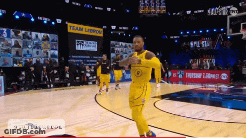 A Basketball Game Is Being Played On A Court With A Sign That Says Team Lebron GIF