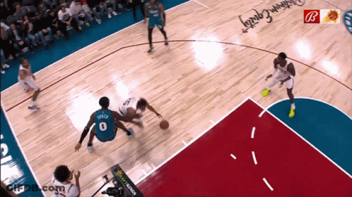 A Basketball Game Is Being Played On A Court With A Southwest Capital Advertisement GIF