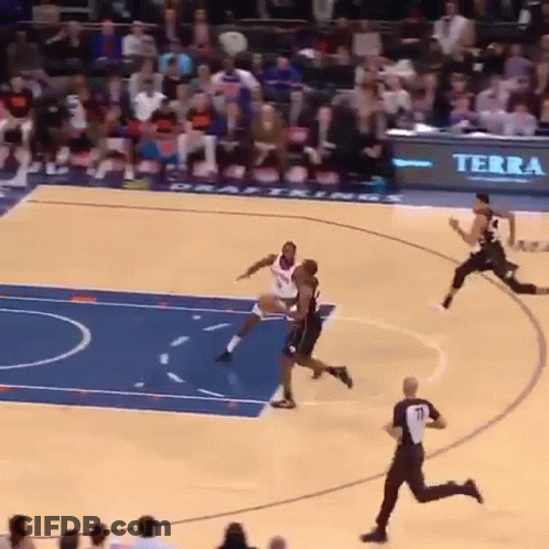 A Basketball Game Is Being Played On A Court With A Terra Sign In The Background GIF