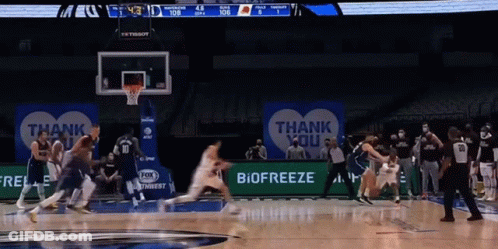 A Basketball Game Is Being Played On A Court With A Thank You Sign In The Background GIF