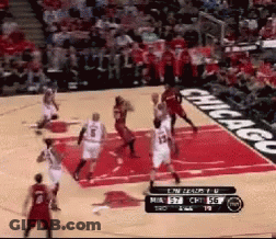 A Basketball Game Is Being Played On A Court With Chicago Written On The Side GIF