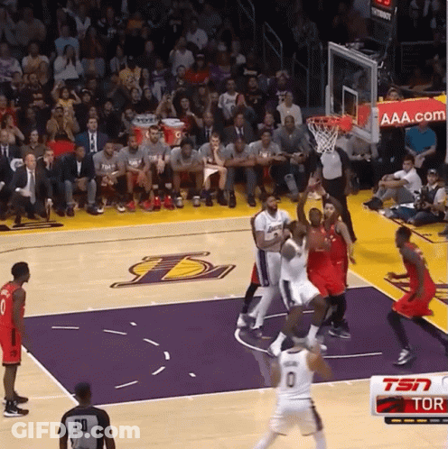 A Basketball Game Is Being Played On A Court With The Lakers Logo GIF