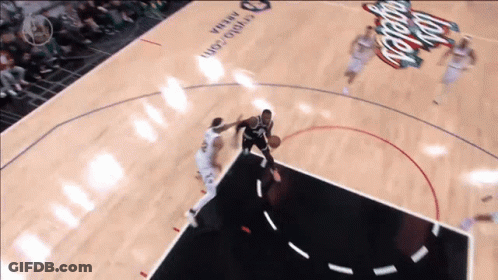 A Basketball Game Is Being Played On A Court With The Word Arena On It GIF