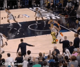 A Basketball Game Is Being Played On A Court With The Word Dallas On It GIF