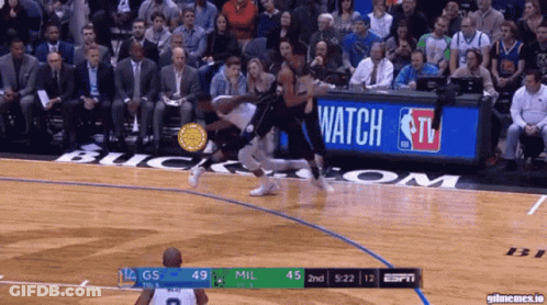 A Basketball Game Is Being Played On Espn Tv GIF