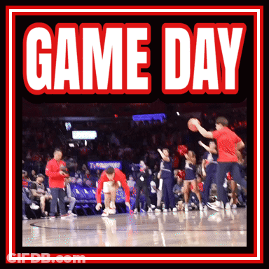 A Basketball Game Is Being Played On Game Day With Cheerleaders On The Court GIF