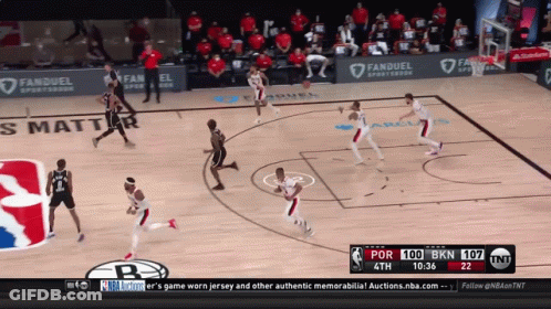 A Basketball Game Is Being Played On Tnt GIF
