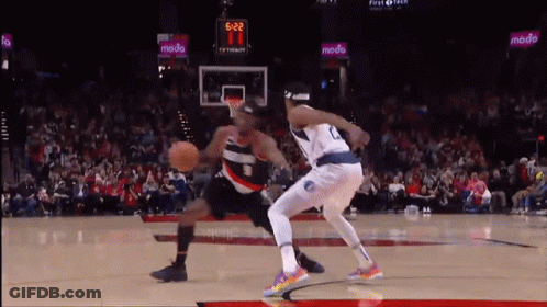 A Basketball Game Is Being Played With A Scoreboard That Says 5:22 GIF