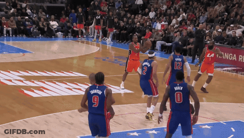 A Basketball Game Is Being Played With Players Number 9 And 12 GIF