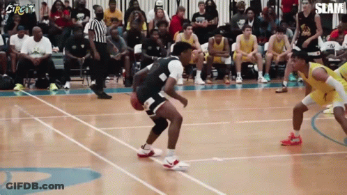 A Basketball Game Is Being Played With The Word Slam On The Bottom GIF