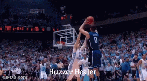 A Basketball Game Is Being Played With The Words Buzzer Beater At The Top GIF