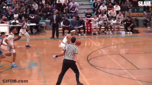 A Basketball Game Is Being Played With The Words Slam On The Bottom GIF