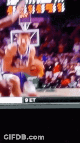 A Basketball Game Is Being Shown On A Television Screen With The Word Get On The Bottom GIF