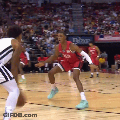 A Basketball Game Is Underway With A Boyd Advertisement In The Background GIF