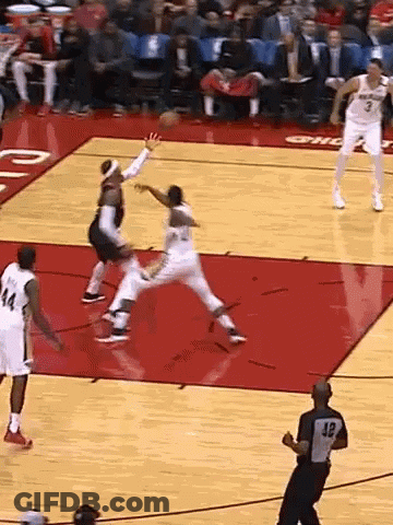 A Basketball Game Is Underway With A Referee Wearing Number 32 GIF