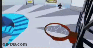 A Basketball Hoop Is In The Middle Of A Room With Stairs . GIF