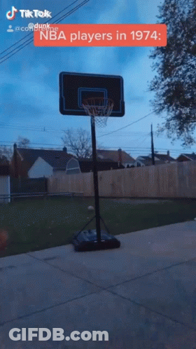 A Basketball Hoop With The Words Nba Players In 1974 GIF