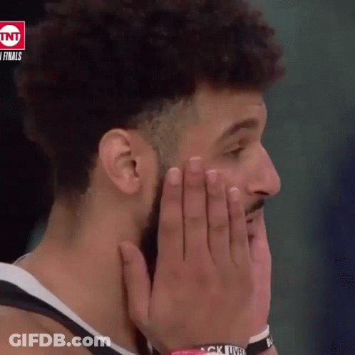 A Basketball Player Covering His Mouth With His Hands While Wearing A Wristband That Says " Black Lives Matter " GIF