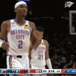 A Basketball Player For Oklahoma City Is Giving A Fist Bump GIF
