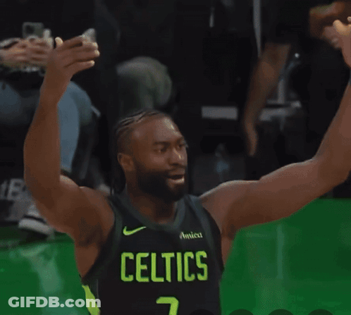 A Basketball Player For The Celtics Is On The Court GIF