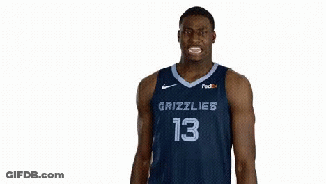 A Basketball Player For The Grizzlies Wears A Number 13 Jersey GIF